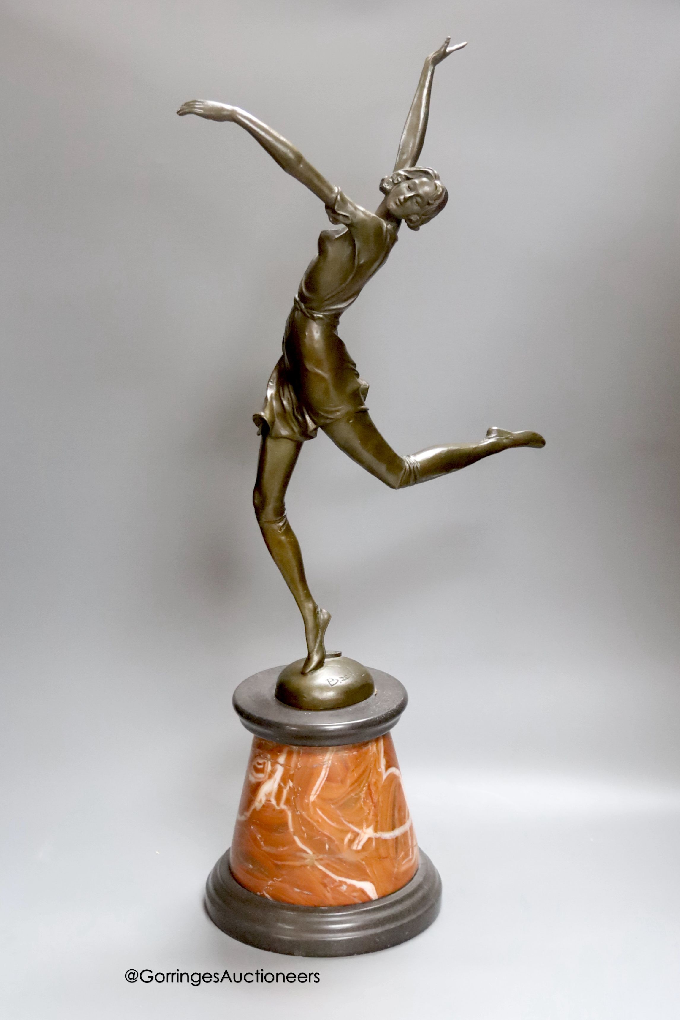 After B. Zach. An Art Deco style bronze figure modelled as a dancer, on a marble base, overall height 65cm